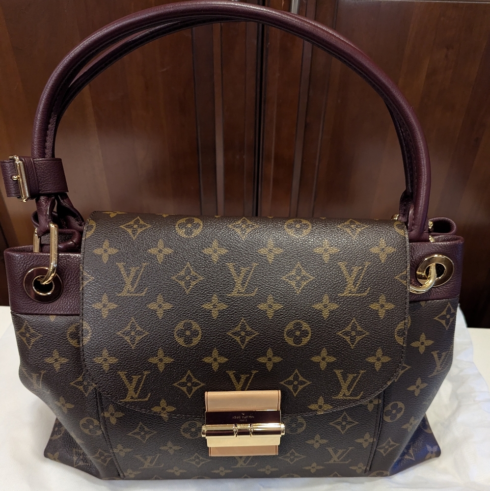 Louis Vuitton Olympe Handbag